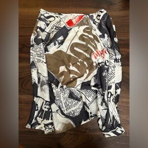 John Galliano newspaper skirt
